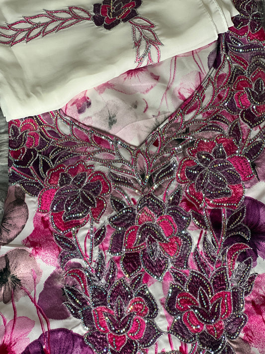 Zahra's pink and purple floral mukhawar dress with intricate hand embroidery and matching scarf