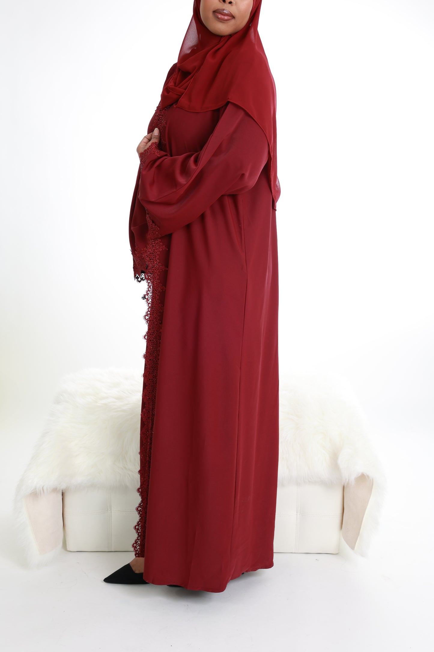 Red with lace detailing along with front and sleeves