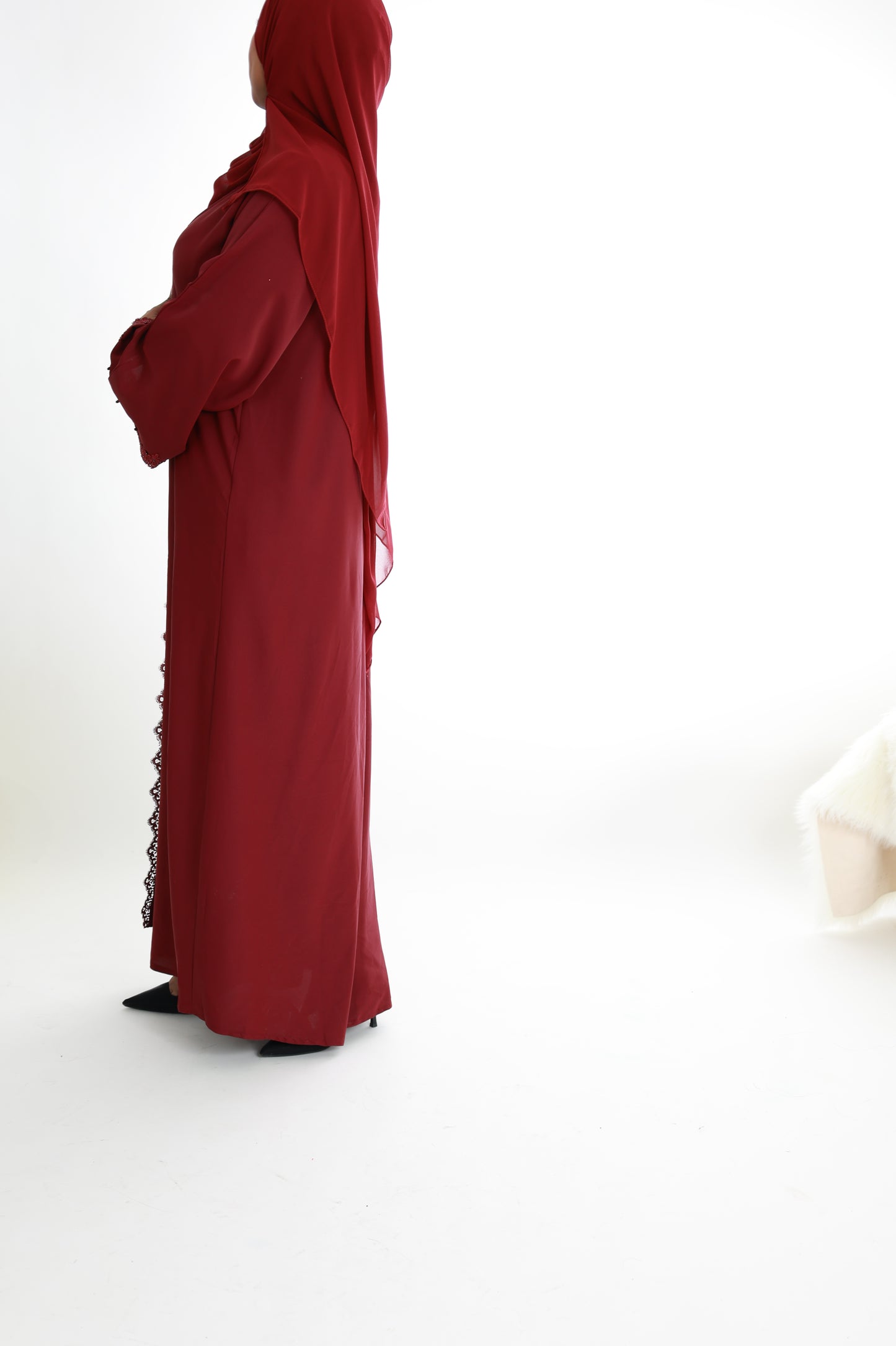 Red with lace detailing along with front and sleeves